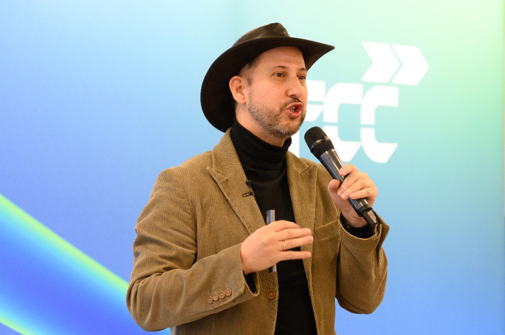 Alex Barrera hosting on stage at FCC Innovation Day
