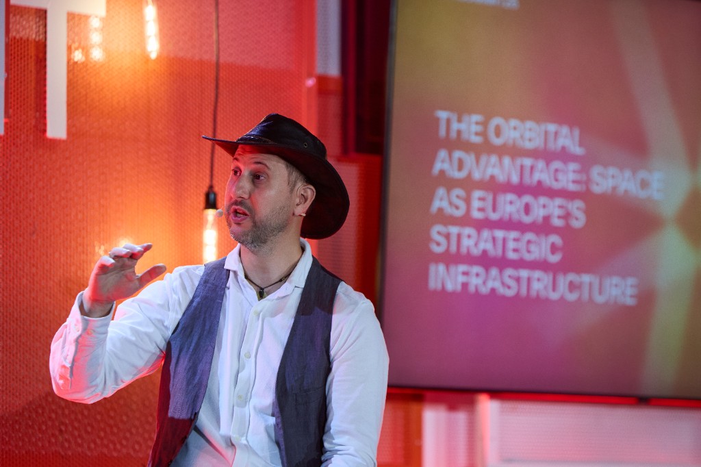 Alex Barrera hosting on stage at South Summit